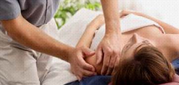 Massage therapist performing trigger point therapy